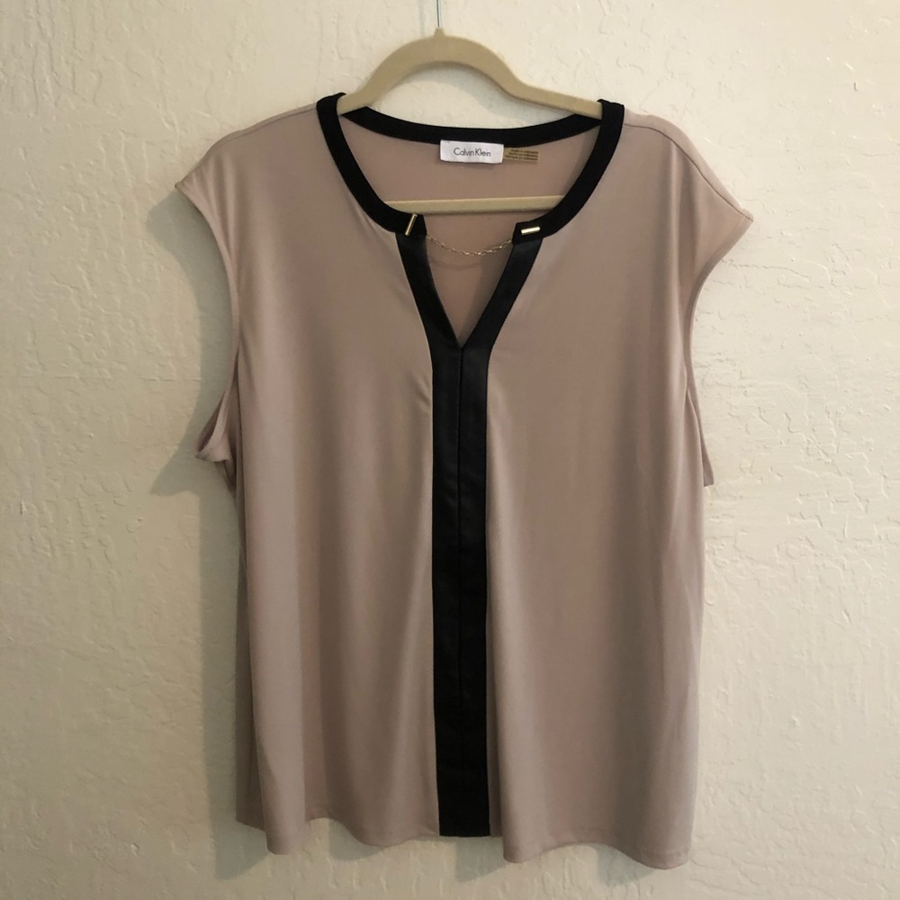 Stretchy Calvin Klein blouse with leather accents